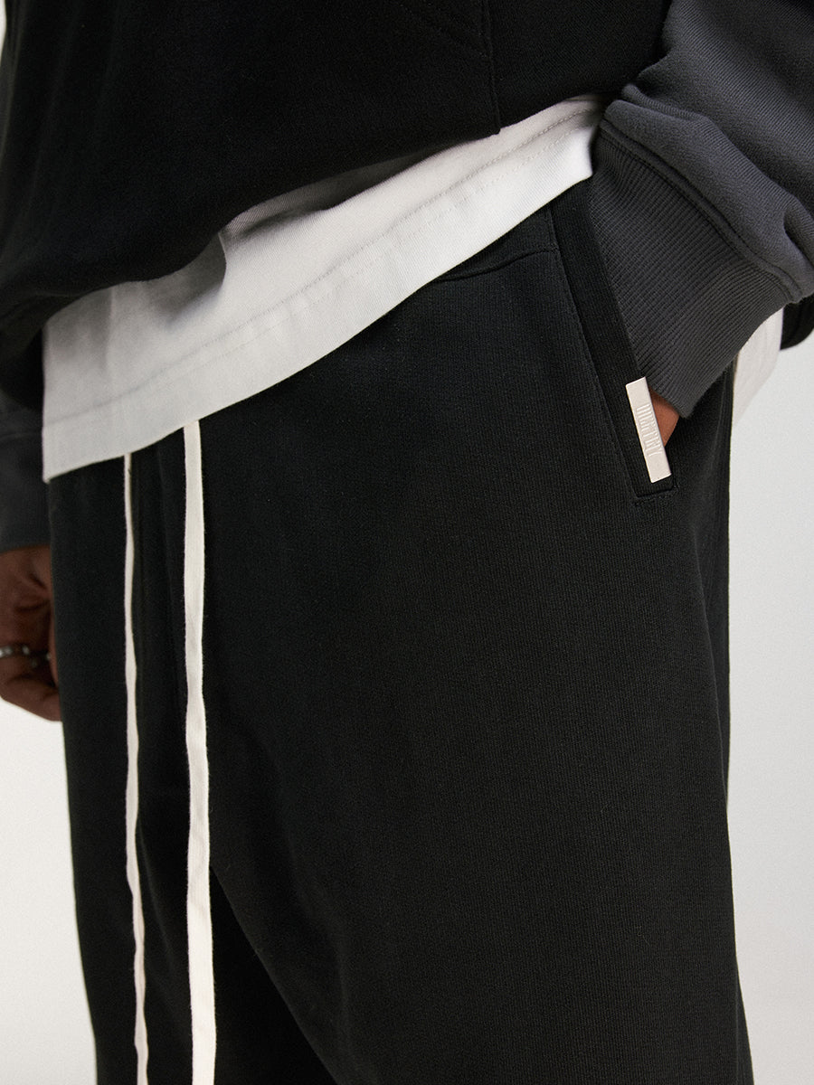DICETINY zipper-cut split deconstructed sweatpants